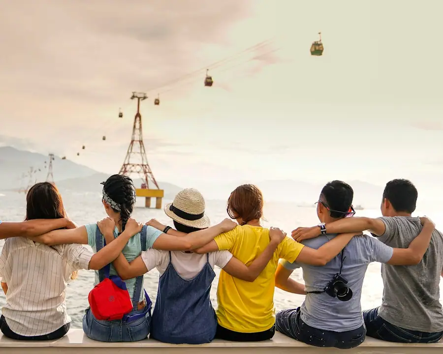 Group of young friends at a viewpoint on holiday