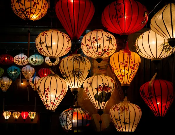 Colourful silk lanterns glowing in Hoi An at night