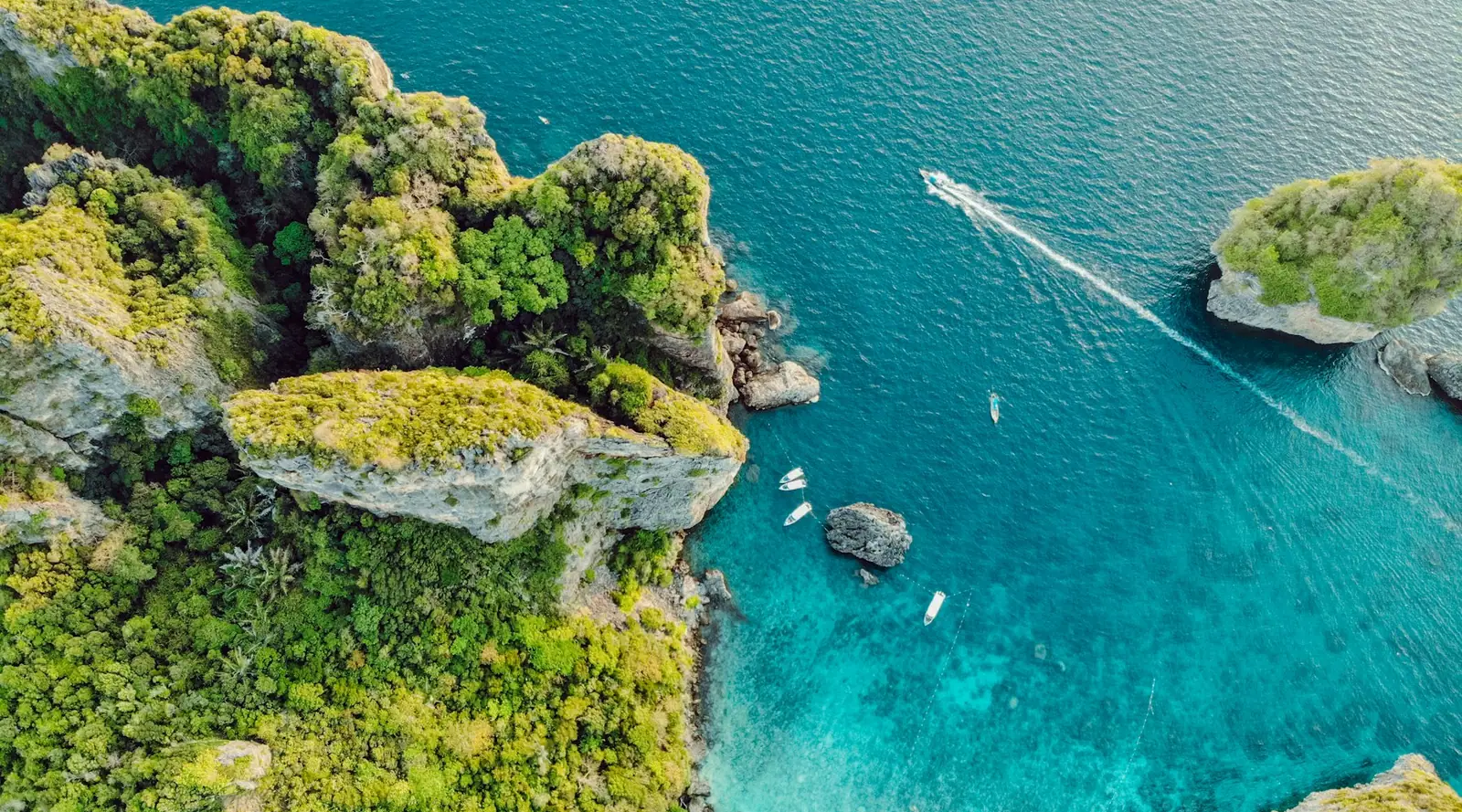 Aerial view of a tropical Thai island and turquoise sea