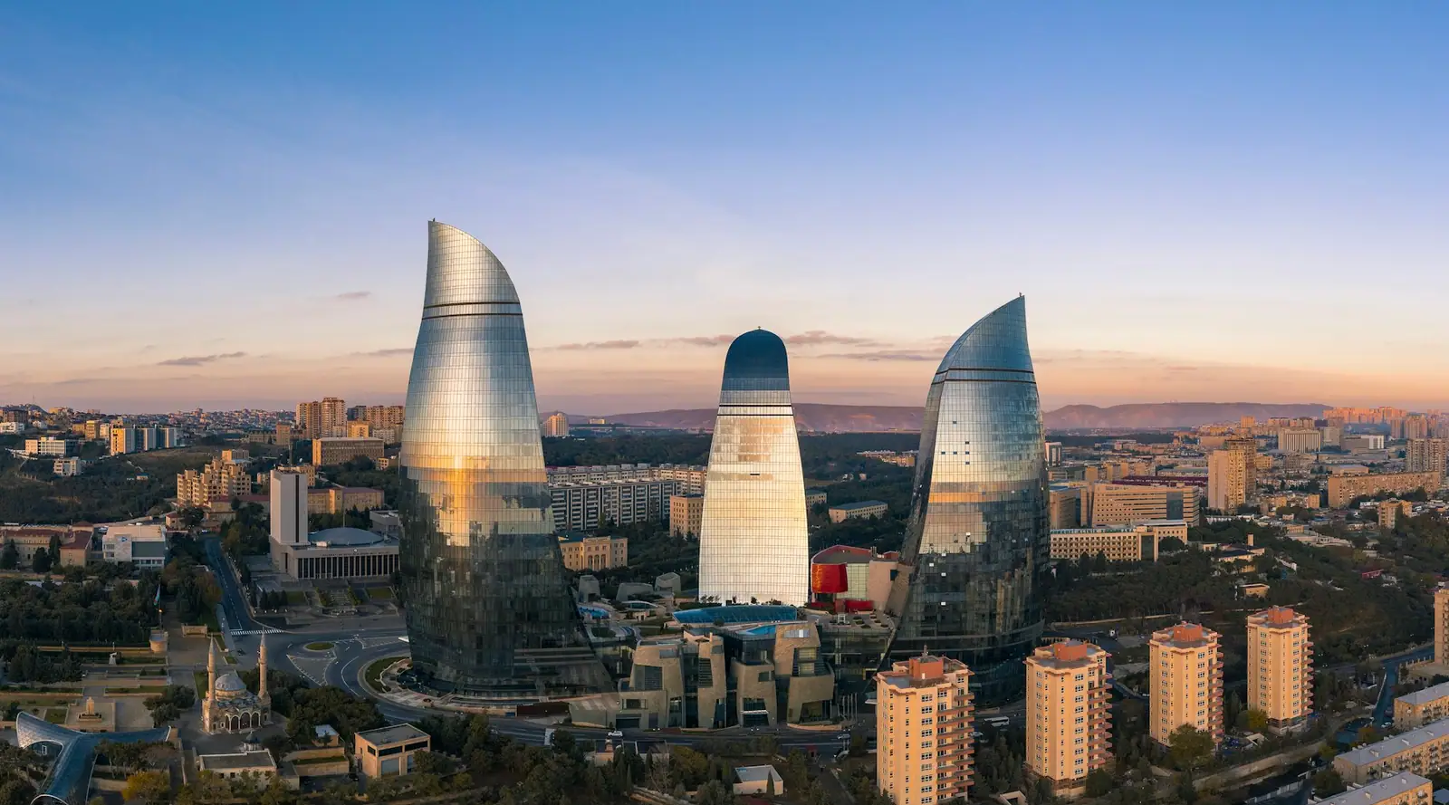 Baku skyline and Flame Towers under a blue sky