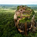 Aerial view of the Sigiriya rock fortress above the forest