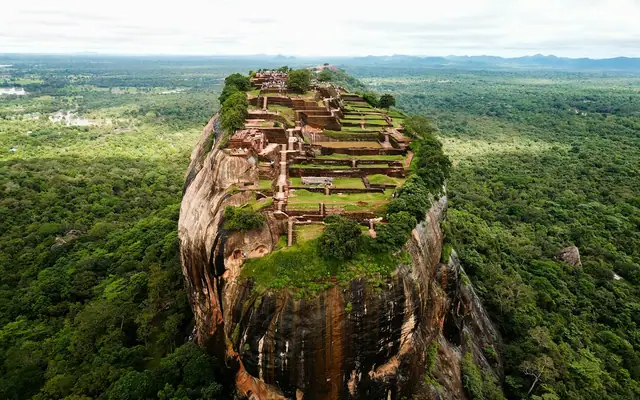 Aerial view of the Sigiriya rock fortress above the forest